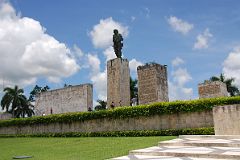 
The Monumento Ernesto Che Guevara monument, mausoleum and museum complex, in Santa Clara is in a vast square guarded by a bronze statue of 'El Che.' The statue was erected in 1987 to mark the 20th anniversary of Guevara's murder in Bolivia. On the block to the right of Che is Che’s farewell letter to Fidel Castro in 1965 … “I feel that I have fulfilled the part of my duty that tied me to the Cuban Revolution in its territory, and I say good-bye to you, the comrades, your people, who are already mine. … Other nations of the world call for my modest efforts. … Ever onward to victory! Our country or death! I embrace you with all my revolutionary fervor. Che.”
